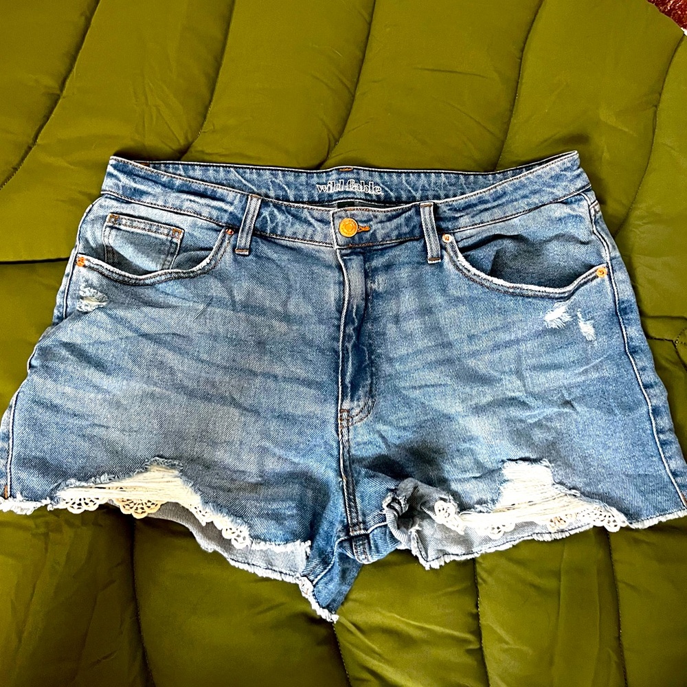 Denim high rise jean shorts with lace pockets